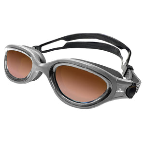 Pair of black swimming goggles with green mirrored lenses